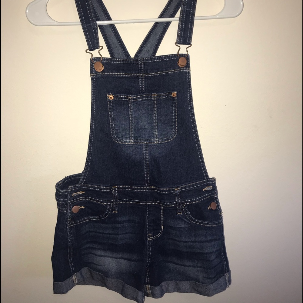 Overall shorts.